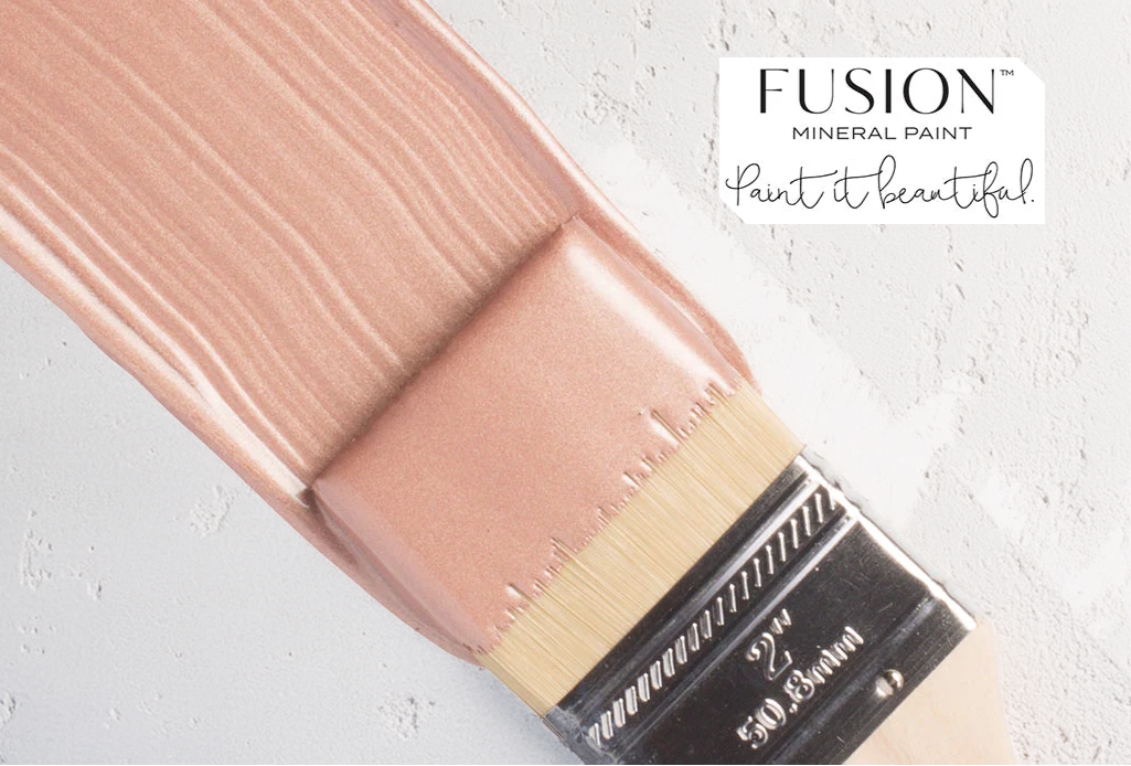 Brush with premium artisanal paint showcasing decorative stenciling and modern home décor possibilities.