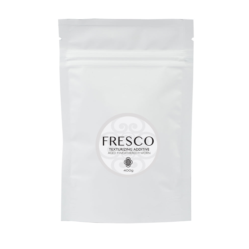 Fresco Texturizing Additive packaging for premium paints and creative projects, perfect for DIY décor and artistic finishes.