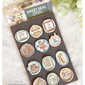Sweet Seal silicone mold with 12 decorative wax seal designs for creative projects and DIY décor.