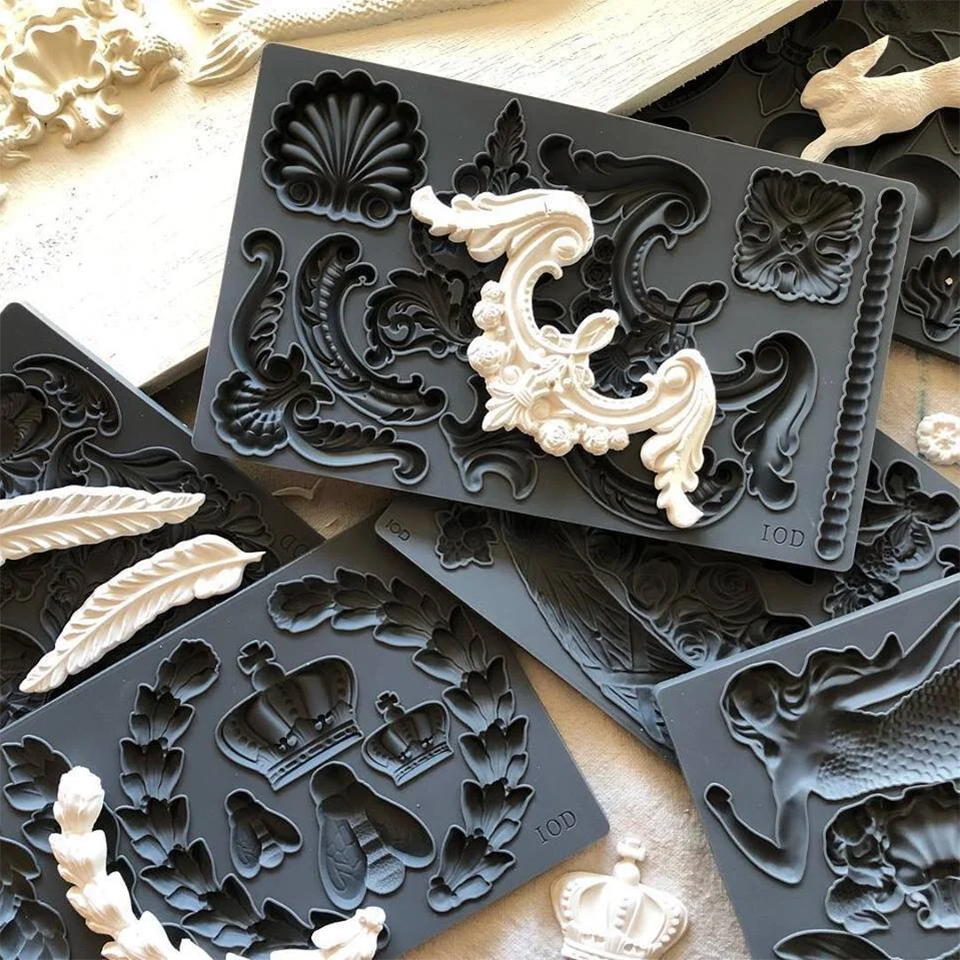 Decorative silicone molds for crafts and DIY home décor, featuring intricate designs for art stencils and embellishments.