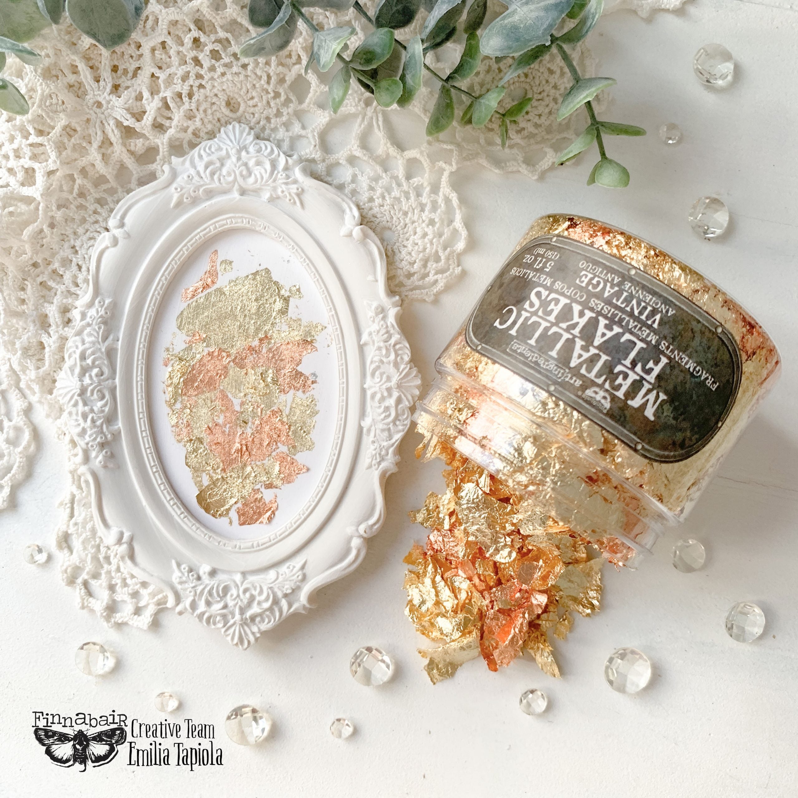 Fine Mica Flakes, Vintage in a jar with decorative accents and an ornate frame, ideal for DIY décor and artistic finishes.